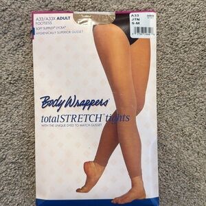 Body Wrappers (Dance) footless tights in nude.